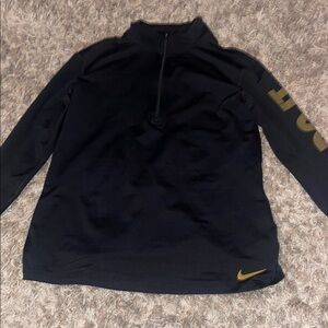Nike Black and Gold pullover wore 1 time. In perfect condition